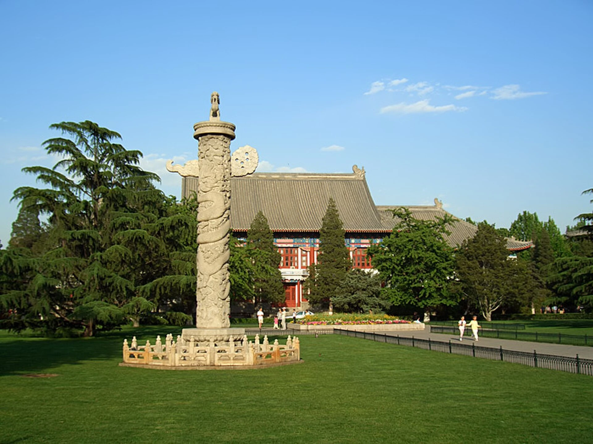 A marble huabiao column stands before the administration building on the Peking University campus